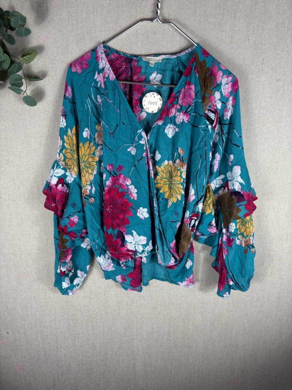 Oddy > New with Tags Teal Floral Wrap Blouse Medium